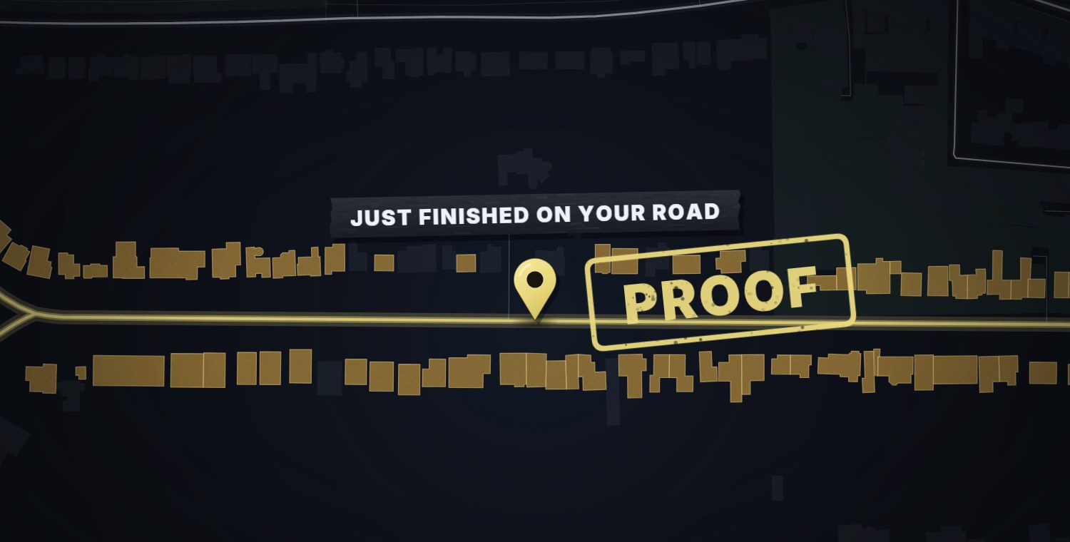 A night map of a residential street, the houses lit, a pin on the street, labelled just finished on your road and stamped proof